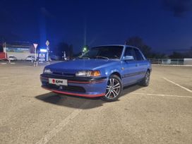  323, 1994