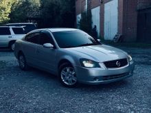 ����������� Altima, 2002