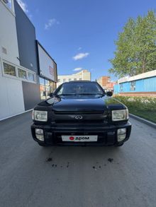  QX4, 1999