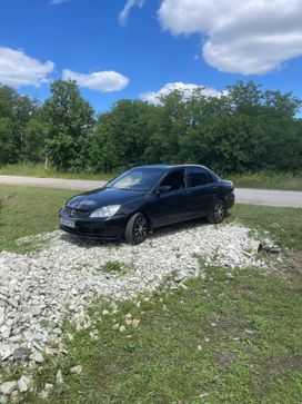  Mitsubishi Lancer 2009 , 450000 , 