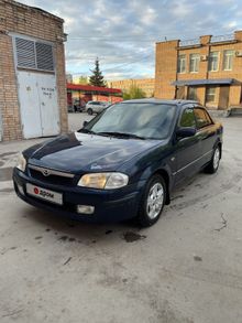  323, 1999