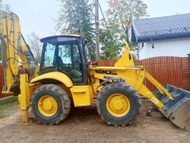 - Komatsu WB93S 2005 , 4600000 , 