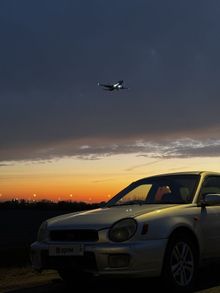 - Impreza, 2002