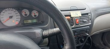   Almera, 2002